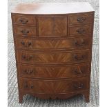 A Georgian style mahogany bow front chest of drawers