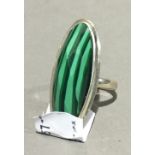 A silver and malachite ring