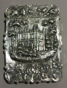 A mid 19th century silver card case with an architectural scene