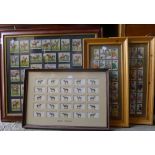 A collection of framed horse racing themed cigarette cards