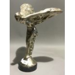 A silver plated model of the Spirit of Ecstasy