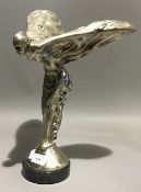 A silver plated model of the Spirit of Ecstasy