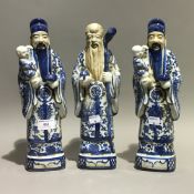 Three Chinese blue and white porcelain figures