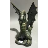 A porcelain incense burner formed as a dragon