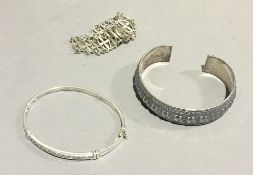 Three silver bracelets