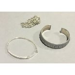 Three silver bracelets