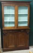 A Victorian mahogany glazed bookcase cabinet