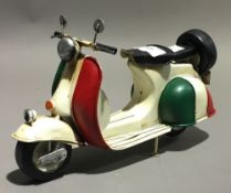 A tin toy scooter