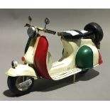 A tin toy scooter