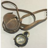 A WWI leather cased compass