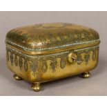 A 19th century engraved brass trinket box Of hinged domed rectangular form,