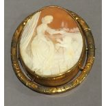 An unmarked yellow metal framed cameo brooch