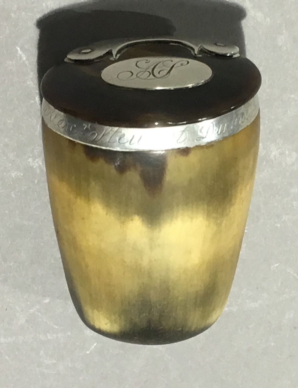 An 18th century silver mounted horn snuff box