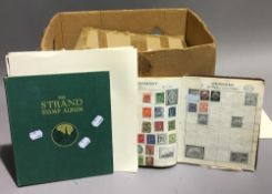 A stamp collection containing a large quantity of Fist Day covers, loose stamps,