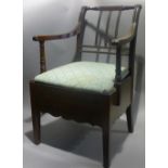 A 19th century mahogany commode chair