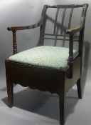 A 19th century mahogany commode chair