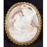 A 19th century unmarked yellow metal framed cameo brooch Centred with a classical maiden and an