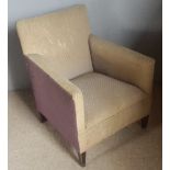 An early 20th century upholstered armchair