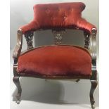 A Victorian mahogany open armchair