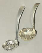 Two silver sifter ladles