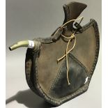 A 19th century leather drinking pouch