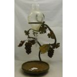 A wrought iron and copper wine stand
