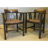 A pair of oak desk chairs