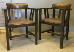 A pair of oak desk chairs