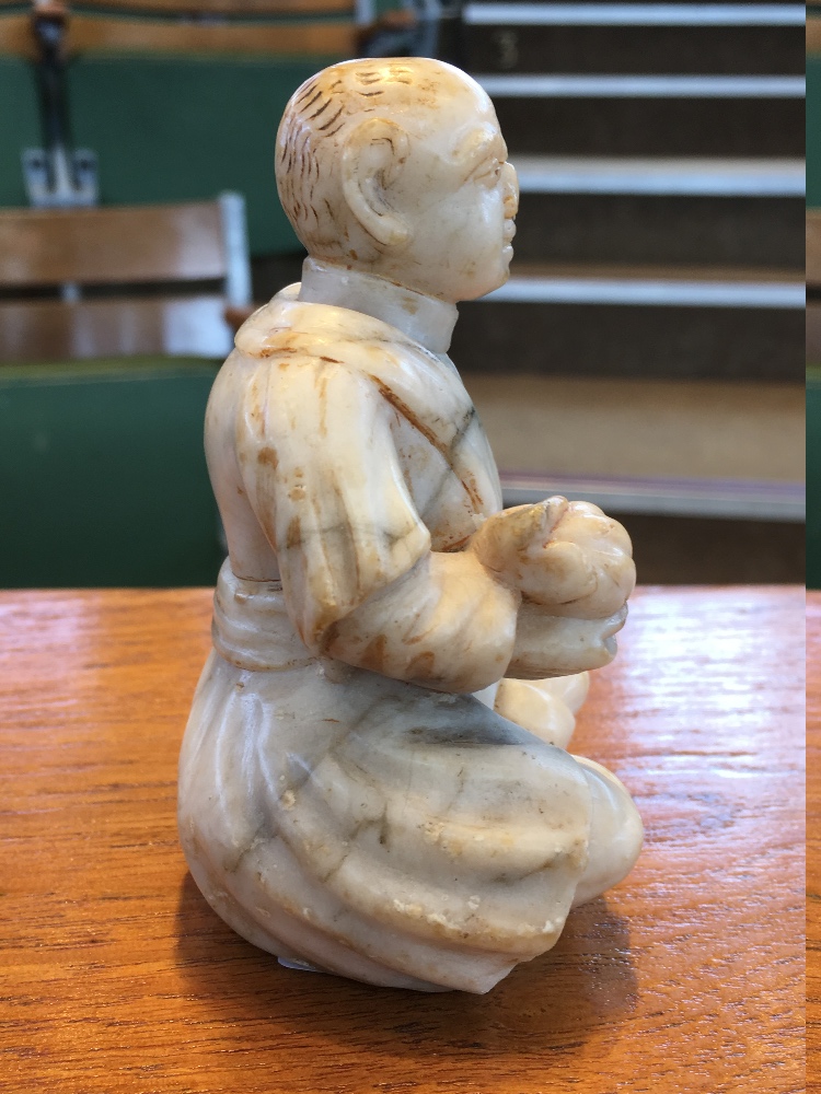 A 19th century Oriental soapstone figure Modelled as a seated gentleman, holding a gourd. - Image 3 of 7
