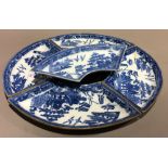 Four Spode blue printed pearlware segment dishes, circa 1790, impressed SPODE,