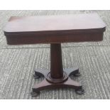 A Victorian rosewood card table