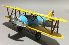 A tin toy bi-plane
