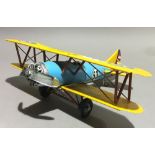 A tin toy bi-plane