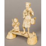 A 19th century Japanese carved ivory group Worked as a salesman with a hand cymbal,