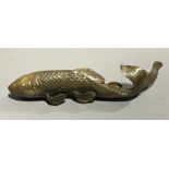 A brass model of a fish