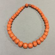 A coral bead necklace