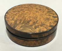 A 19th century burr wood and tortoiseshell snuff box