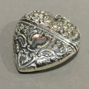 A silver heart form box