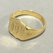 An 18 ct gold signet ring (7.