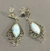 A pair of silver opal and marcasite earrings