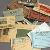 A quantity of vintage lettercards and postcard booklets