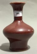 A Chinese porcelain red ground vase