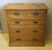 A Victorian satin walnut chest of drawers