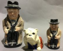 Two Royal Doulton Winston Churchill character jugs and a Royal Doulton Union Jack bull dog