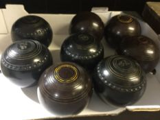 Two sets of bowling woods