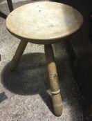 A Victorian milking stool