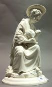 A Victorian Parian figure of a young girl holding a cat