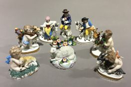 A quantity of small 19th century porcelain figures each with gold anchor mark