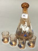 A mid 20th century decanter and glasses,