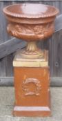 A Victorian stoneware garden pedestal urn